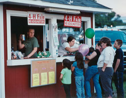 people at the secretary's booth