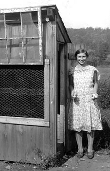 Louise holds eggs she gathered from the hen house.